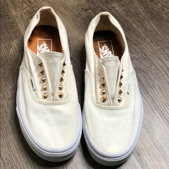 vans slip ons off white